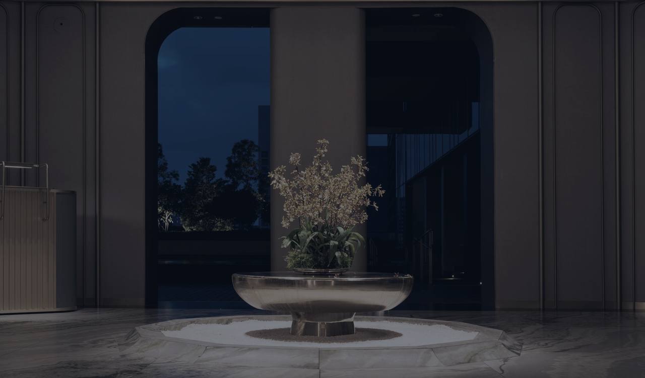 A quiet hotel lobby at night, with dusk through the arches
